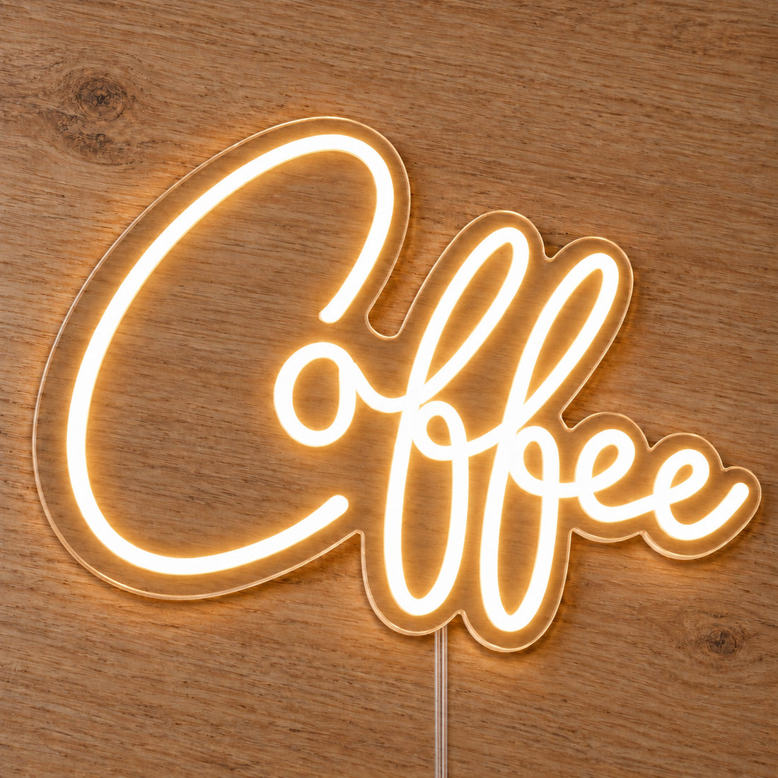 Coffee Script LED Neon Sign - Cafe and Home Kitchen Sign in warm white, featuring Coffee script lettering on a wooden surface.