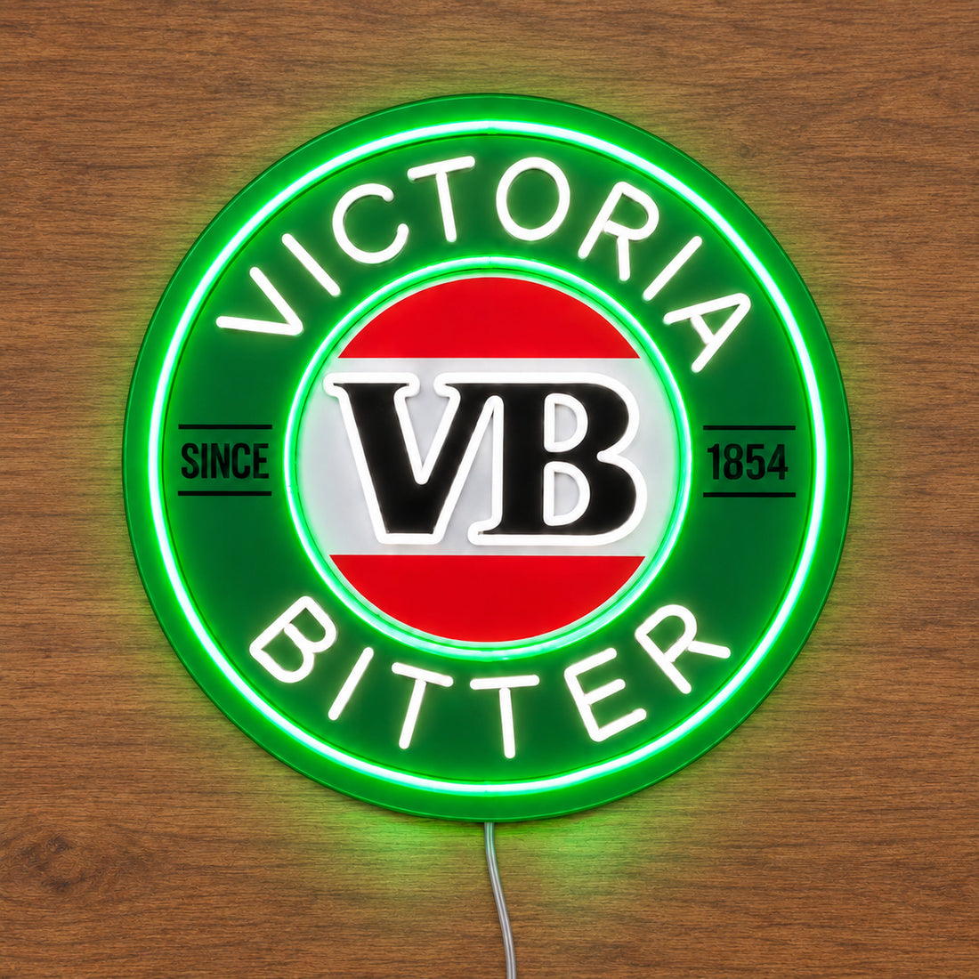 Victoria Bitter LED Neon Sign, featuring illuminated beer-brand logo on a wooden surface.