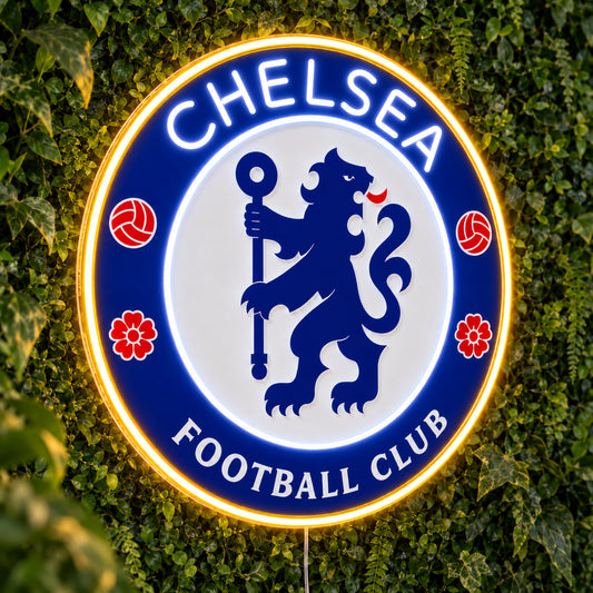 Chelsea LED Neon Sign, featuring illuminated team logo on a green foliage wall.