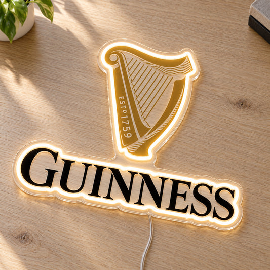 Guinness LED Neon Sign, featuring beer-brand logo displayed on a wooden surface.