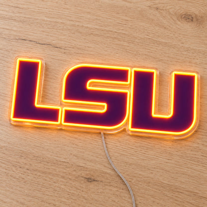 LSU Tigers LED Neon Sign, featuring team logo displayed on a wooden surface.