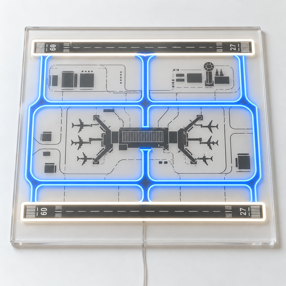 Airport Layout Neon Sign, featuring a stylised airport layout, on a single clear acrylic backing displayed on a white surface.