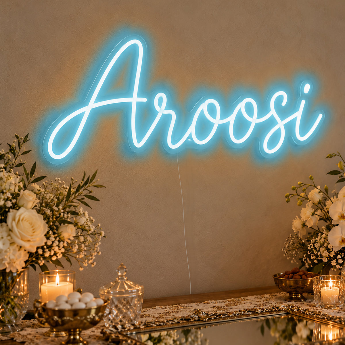 Aroosi Neon Sign in ice blue LED neon on clear acrylic, angled view