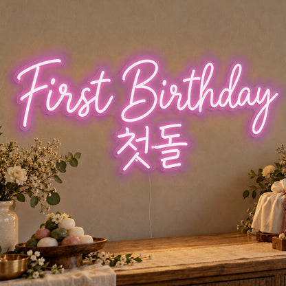 First Birthday English & Korean Neon Sign in pink LED neon on clear acrylic, angled view