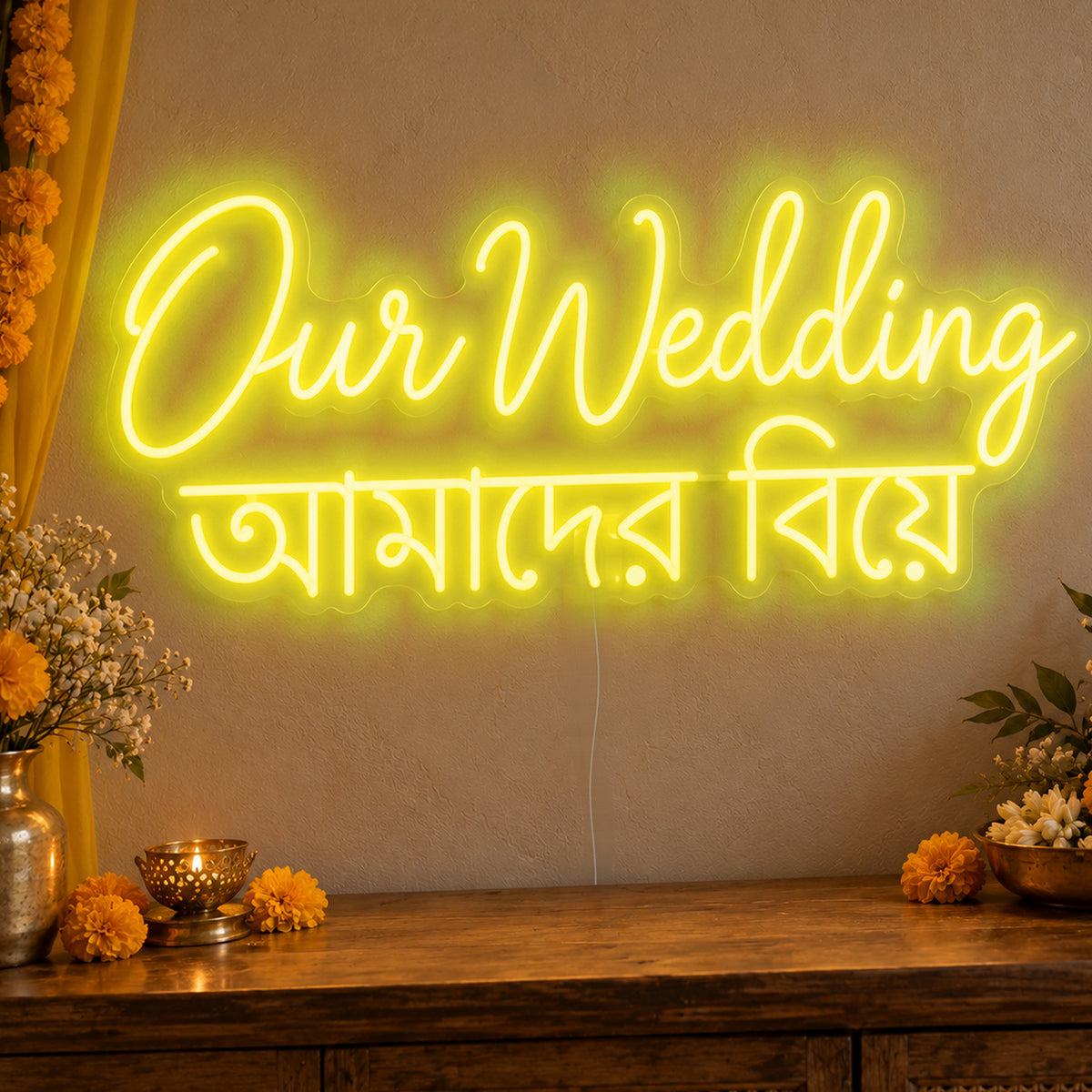 Our Wedding English & Bengali Neon Sign in yellow LED neon on clear acrylic, angled view