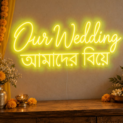 Our Wedding English & Bengali Neon Sign in yellow LED neon on clear acrylic, angled view