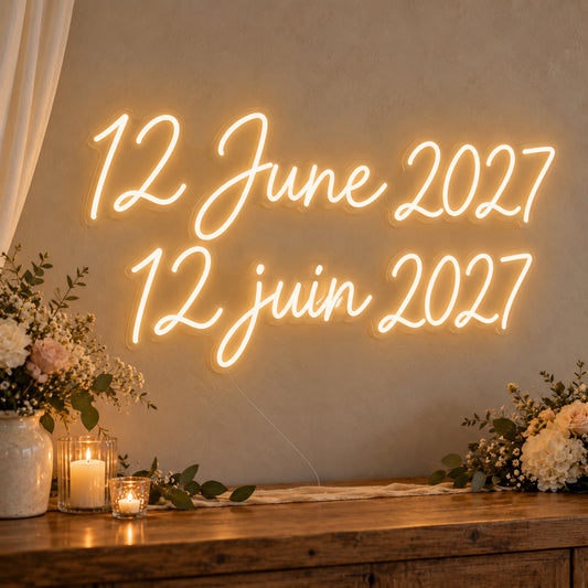 Personalised Bilingual Wedding Date Neon Sign on clear cut-to-shape acrylic in an illuminated wall display; example personalisation shown.