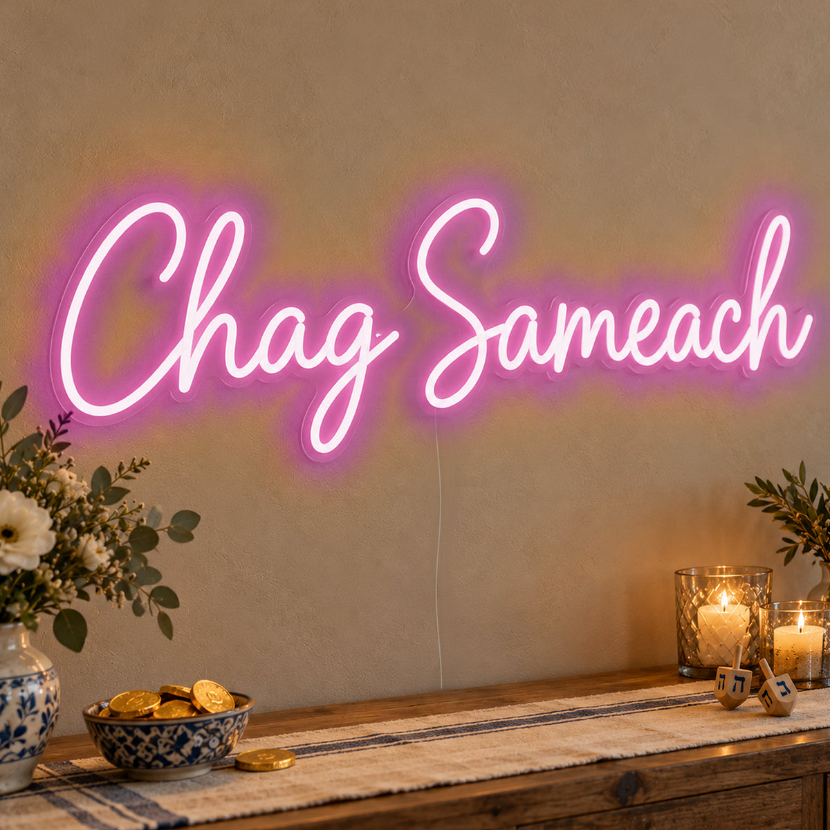 Chag Sameach Neon Sign in pink LED neon on clear acrylic, angled view