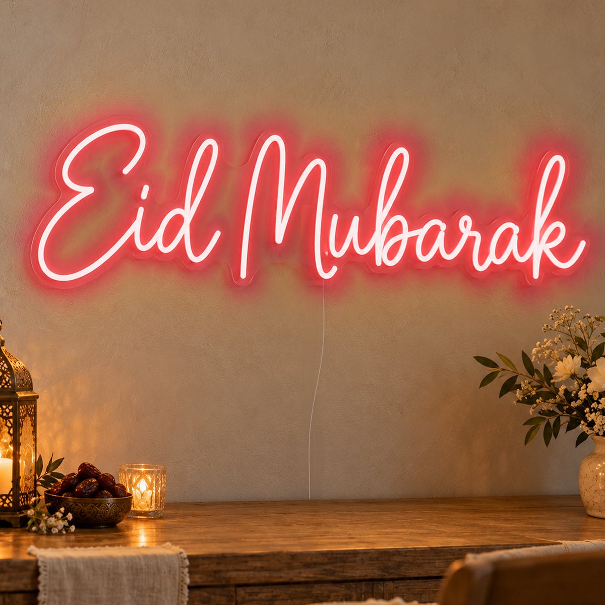 Eid Mubarak Neon Sign in red LED neon on clear acrylic, angled view