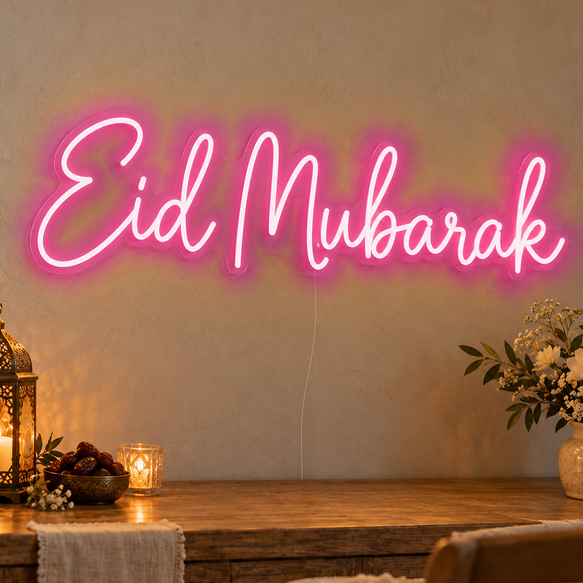 Eid Mubarak Neon Sign in rose red LED neon on clear acrylic, angled view