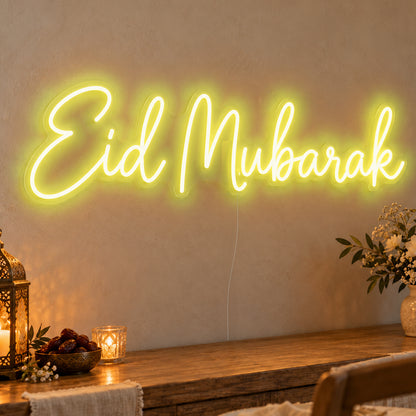 Eid Mubarak Neon Sign in yellow LED neon on clear acrylic, angled view