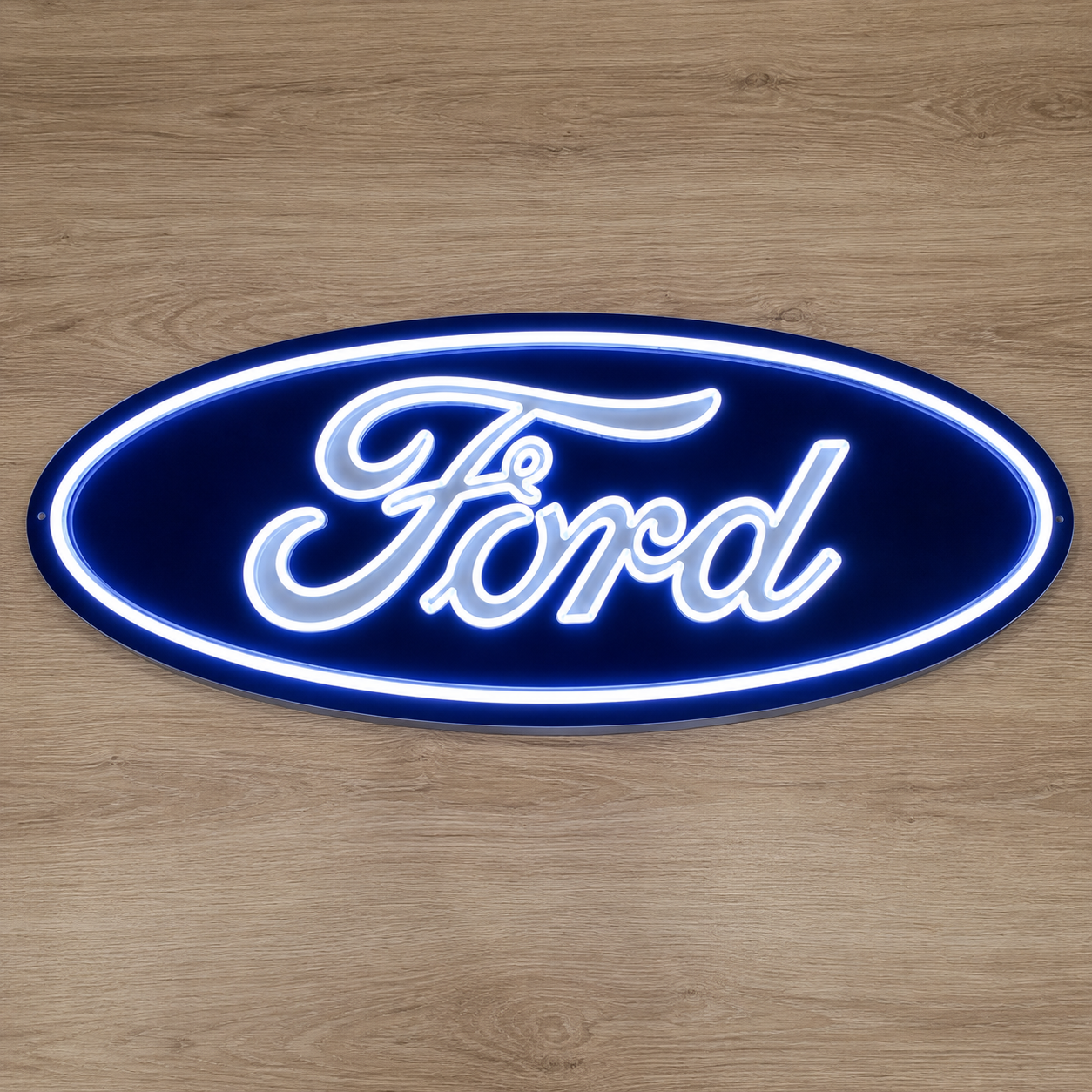 Ford oval LED neon sign with white script on blue background, front view on a timber wall