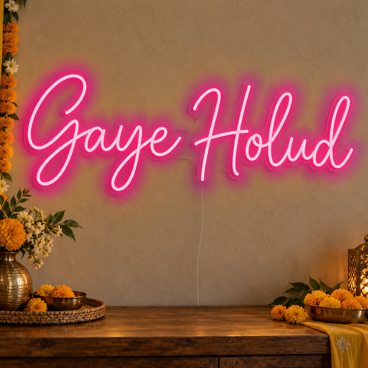 Gaye Holud Neon Sign in rose red LED neon on clear acrylic, angled view