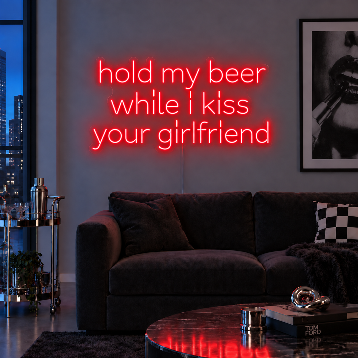 Hold My Beer While I Kiss Your Girlfriend Neon Sign in red above a burgundy sofa.