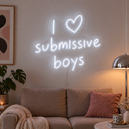 I Love Submissive Boys Neon Sign, RGB colour-changing option shown in white above a neutral sofa.