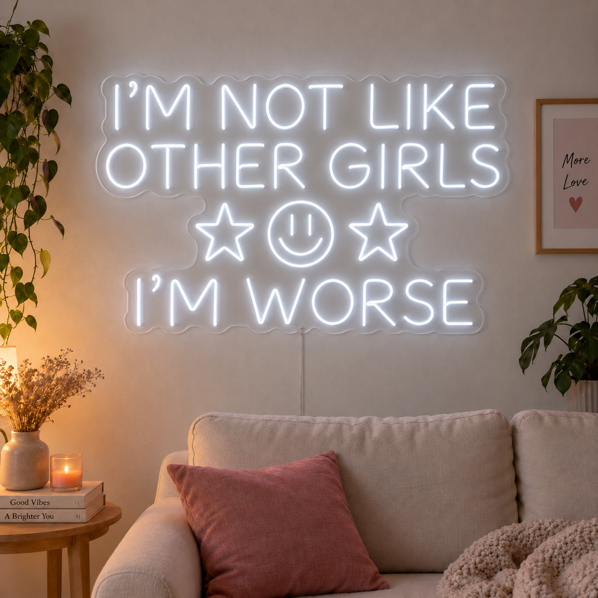 I'm Not Like Other Girls I'm Worse Neon Sign, RGB colour-changing option shown in white with stars and a smiley face above a cream sofa.
