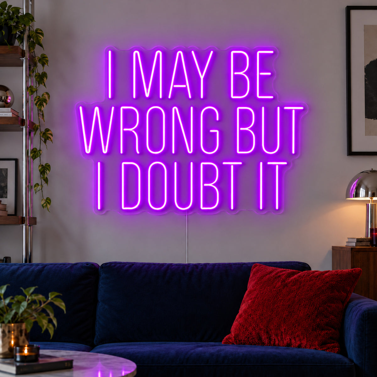 I May Be Wrong But I Doubt It Neon Sign with purple lighting, displayed above a dark blue sofa.