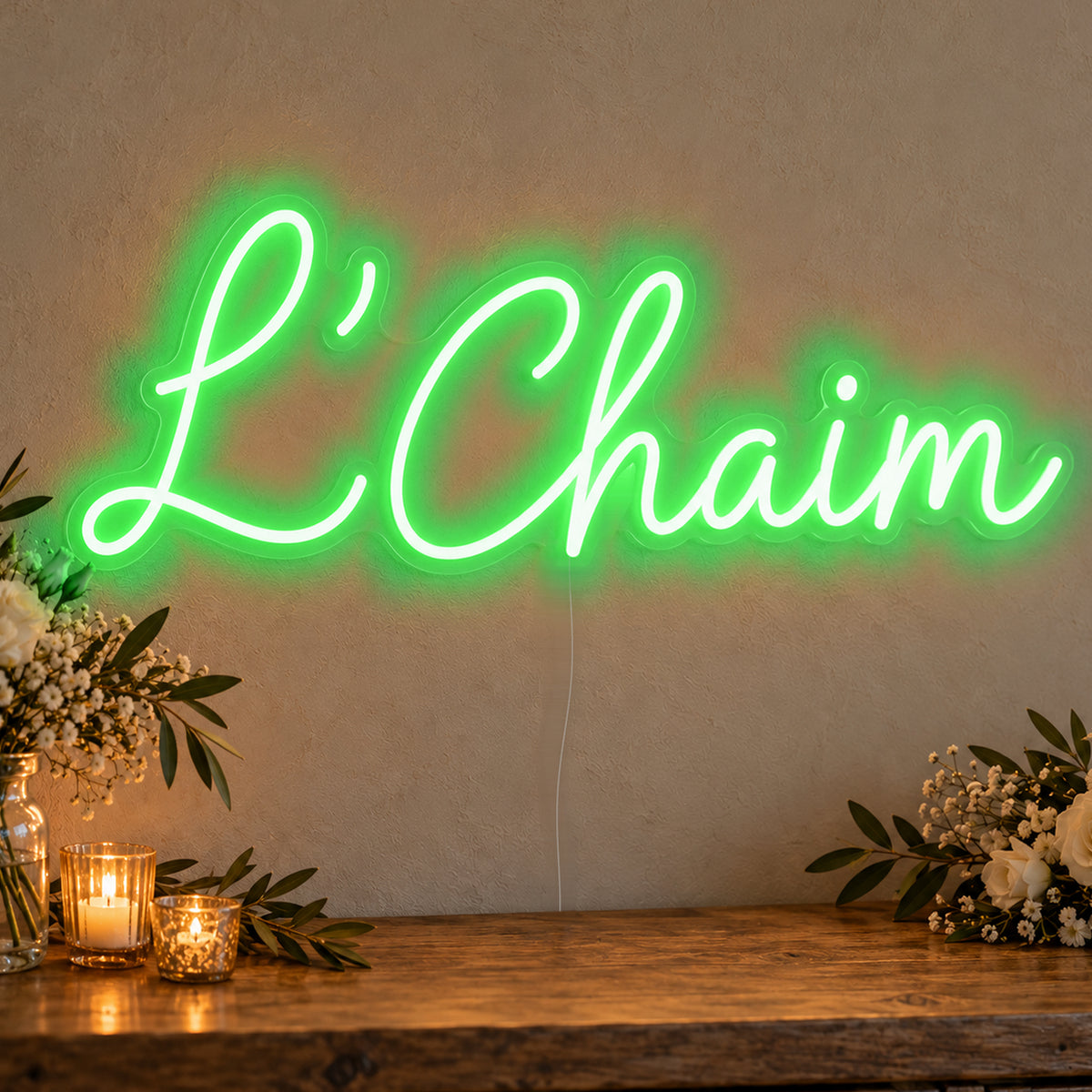 L’Chaim Neon Sign in green LED neon on clear acrylic, angled view