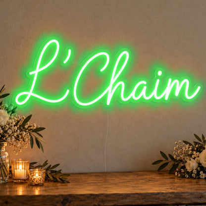 L’Chaim Neon Sign in green LED neon on clear acrylic, angled view