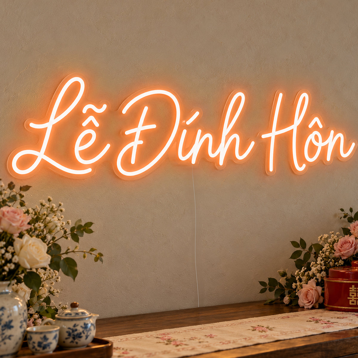 Lễ Đính Hôn Neon Sign in orange LED neon on clear acrylic, angled view