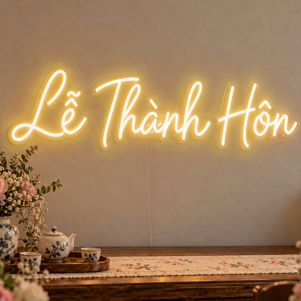Lễ Thành Hôn Neon Sign in gold LED neon on clear acrylic, angled view