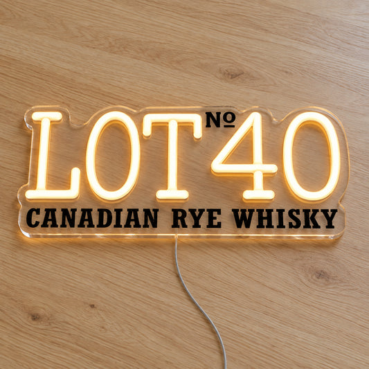 Lot No.40 LED neon sign on a light wooden surface, front view
