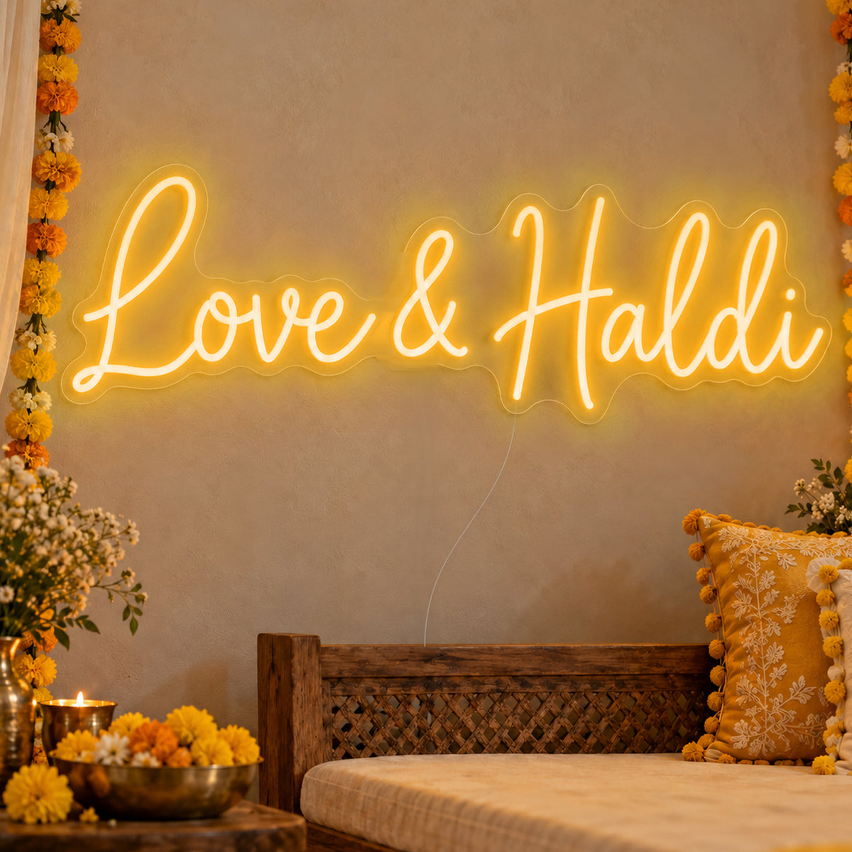 Love Haldi Neon Sign in gold LED neon on clear acrylic, angled view