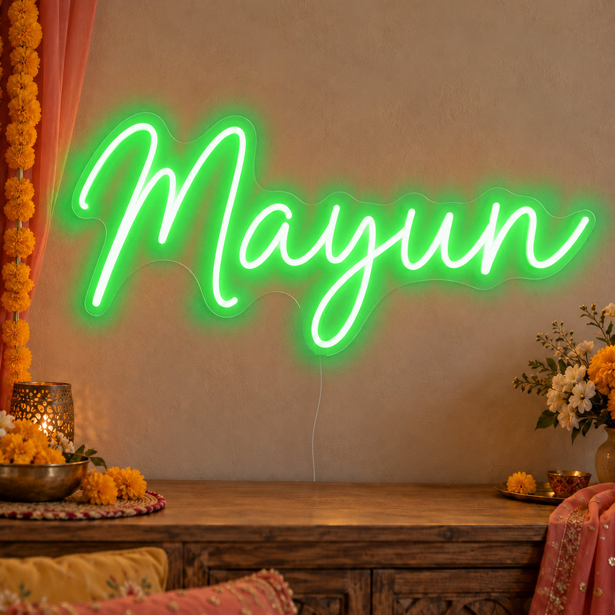 Mayun Neon Sign in green LED neon on clear acrylic, angled view