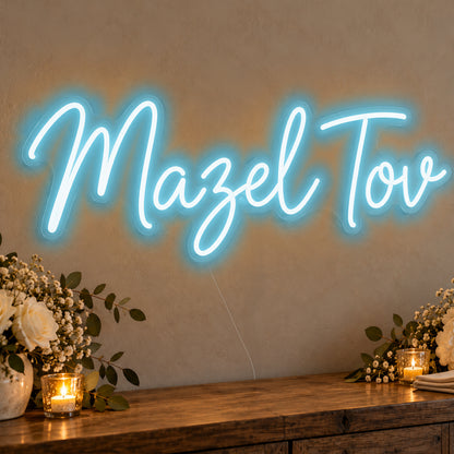 Mazel Tov Neon Sign in ice blue LED neon on clear acrylic, angled view