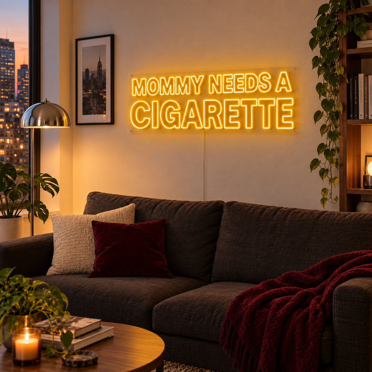 Mommy Needs A Cigarette Neon Sign glowing gold above a brown sofa.