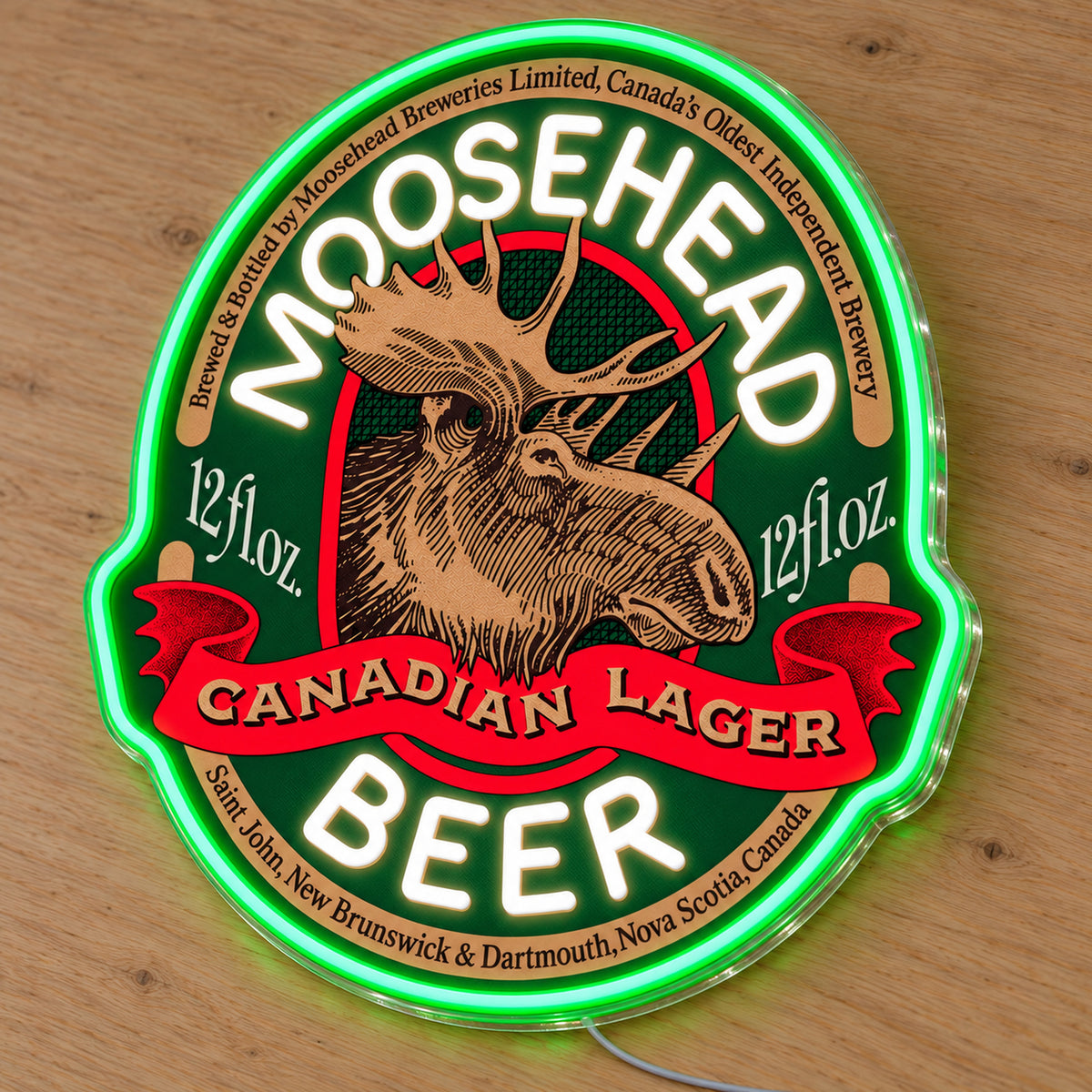 Moosehead LED neon sign on a light wooden surface, second angled view