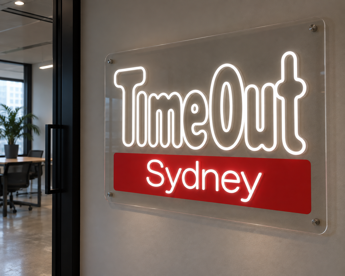 White TimeOut Sydney LED neon sign on clear acrylic, shown as custom sign inspiration for Parramatta.