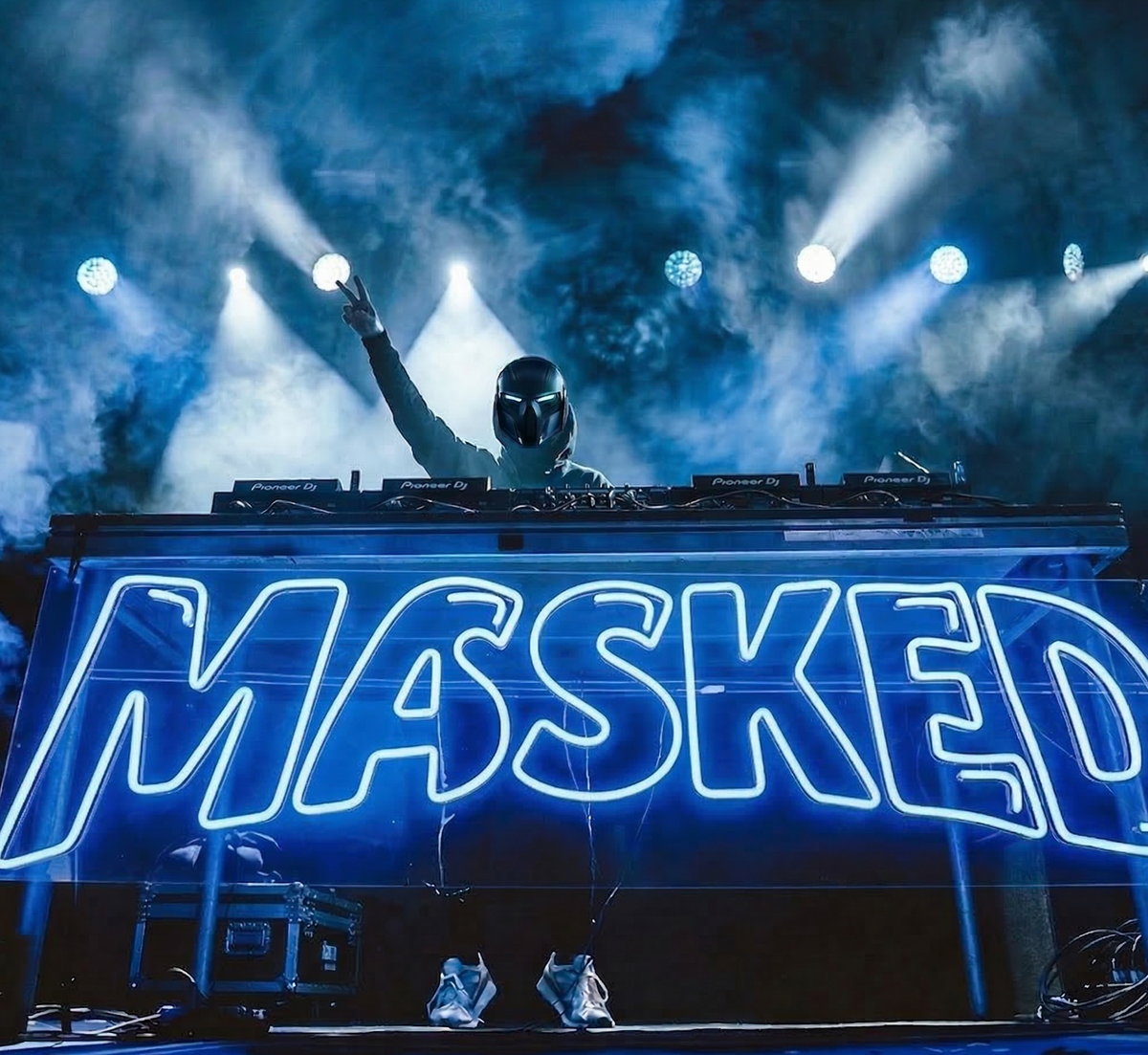 Blue MASKED LED neon sign across a DJ booth, shown as custom sign inspiration for Prospect.