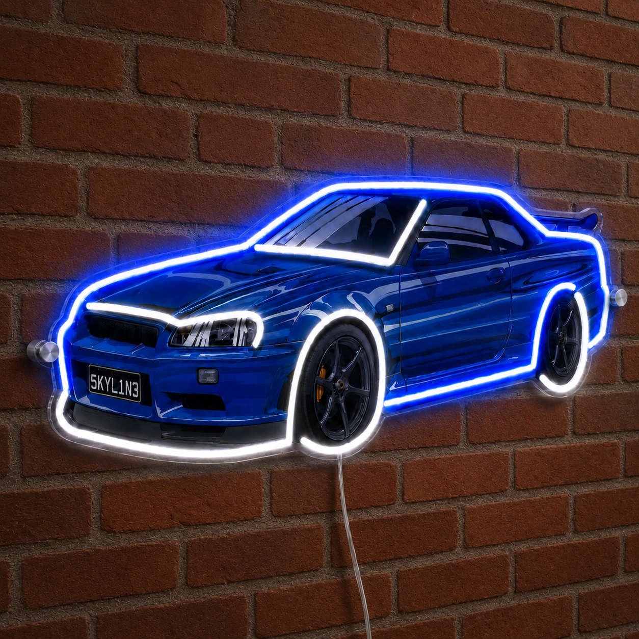 Nissan Skyline R34 neon sign mounted on a brick wall in a garage setting