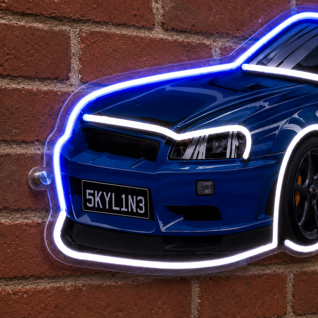 Close-up detail of the Nissan Skyline R34 LED neon sign front bumper and headlights