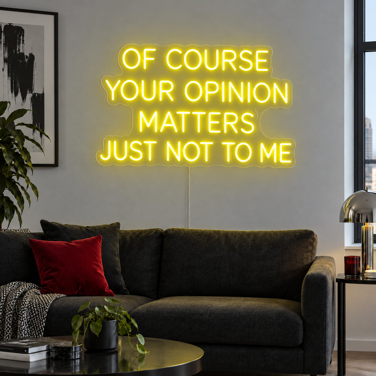 Of Course Your Opinion Matters Just Not To Me Neon Sign with yellow lighting, displayed above a black sofa.