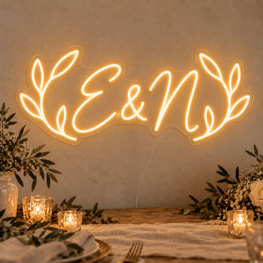Personalised Olive Initials Neon Sign on clear cut-to-shape acrylic in an illuminated wall display; example personalisation shown.