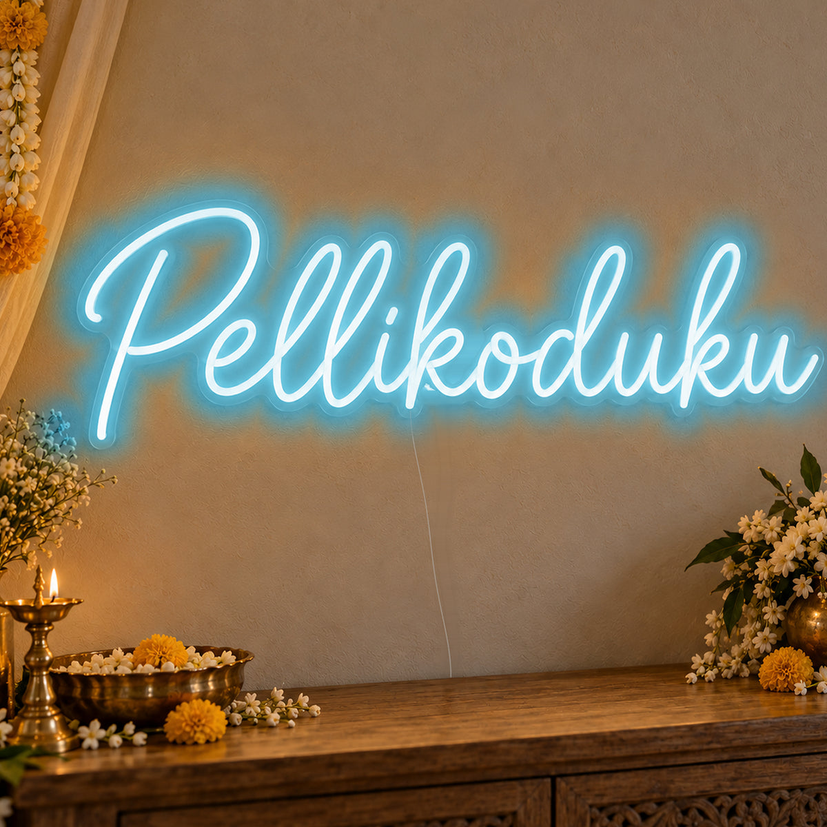 Pellikoduku Neon Sign in ice blue LED neon on clear acrylic, angled view