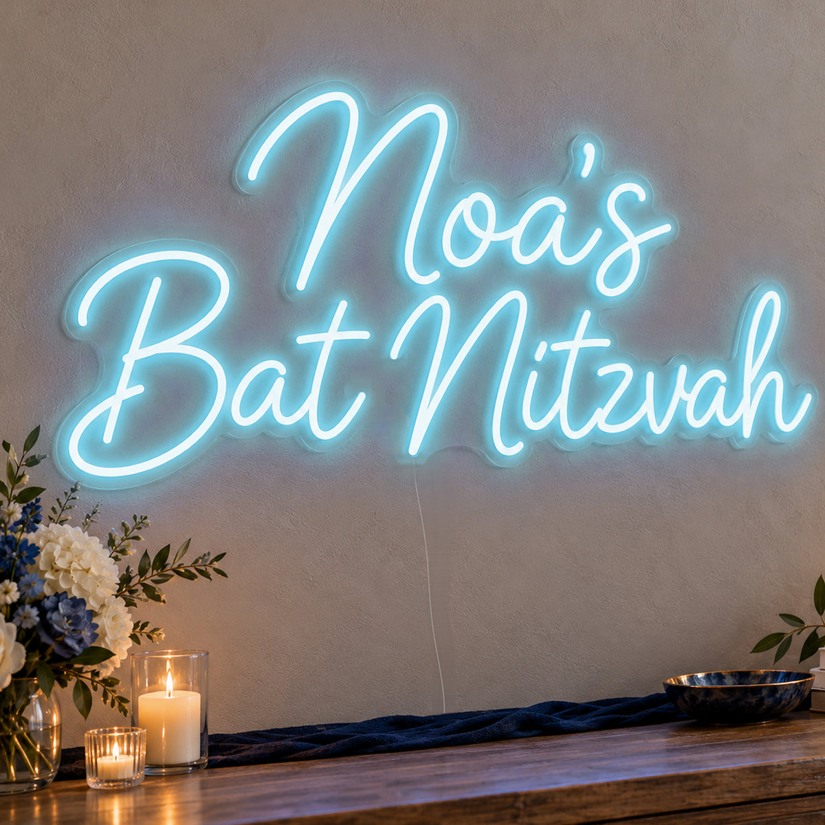 Personalised Bat Mitzvah Neon Sign in ice blue LED neon on clear acrylic, angled view