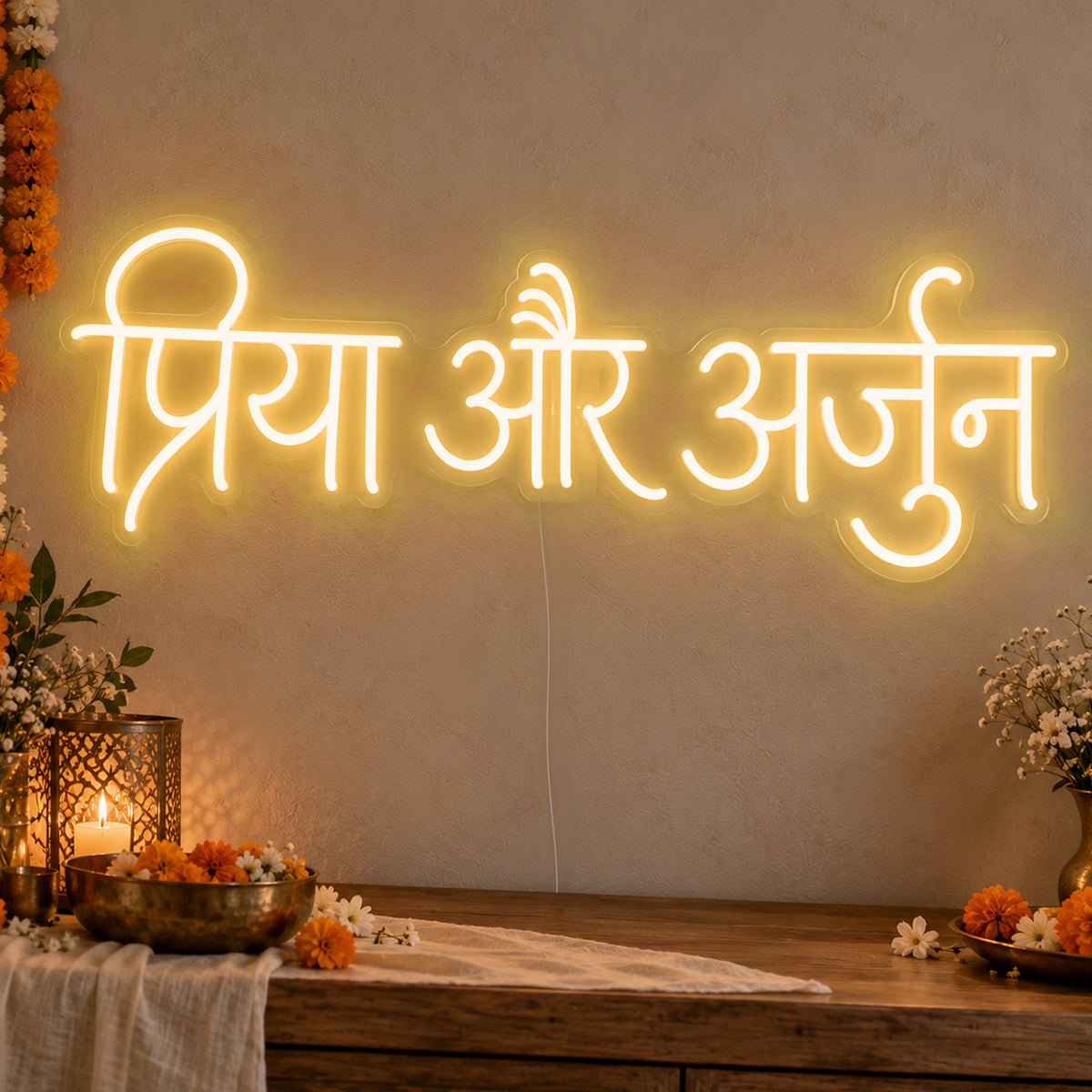 Personalised Devanagari Couple Names Neon Sign in gold LED neon on clear acrylic, angled view