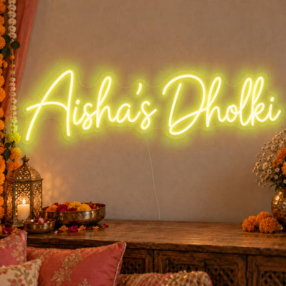 Personalised Dholki Neon Sign in yellow LED neon on clear acrylic, angled view