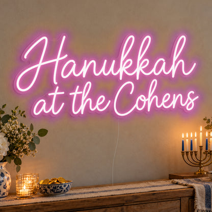 Personalised Family Hanukkah Neon Sign in pink LED neon on clear acrylic, angled view