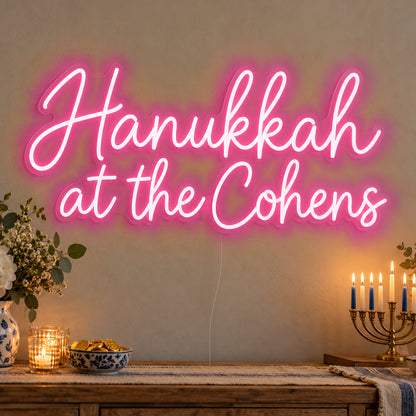 Personalised Family Hanukkah Neon Sign in rose red LED neon on clear acrylic, angled view