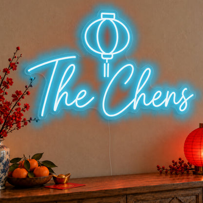 Personalised Family Lantern Neon Sign in ice blue LED neon on clear acrylic, angled view