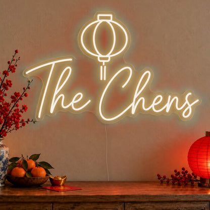 Personalised Family Lantern Neon Sign in warm white LED neon on clear acrylic, angled view