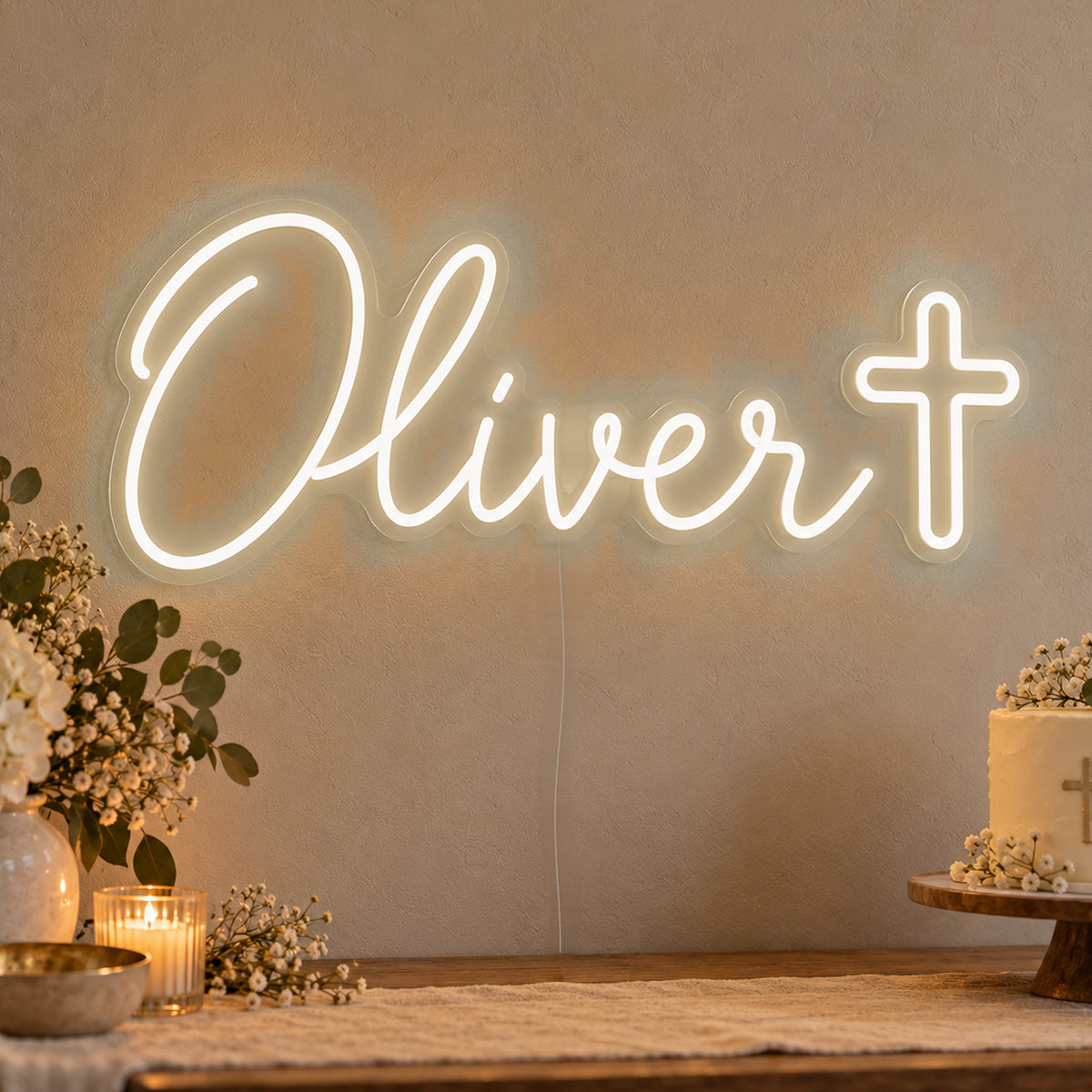 Personalised Name Cross Neon Sign in warm white LED neon on clear acrylic, angled view