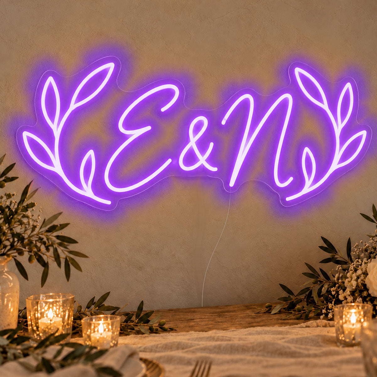Personalised Olive Initials Neon Sign in purple LED neon on clear acrylic, angled view