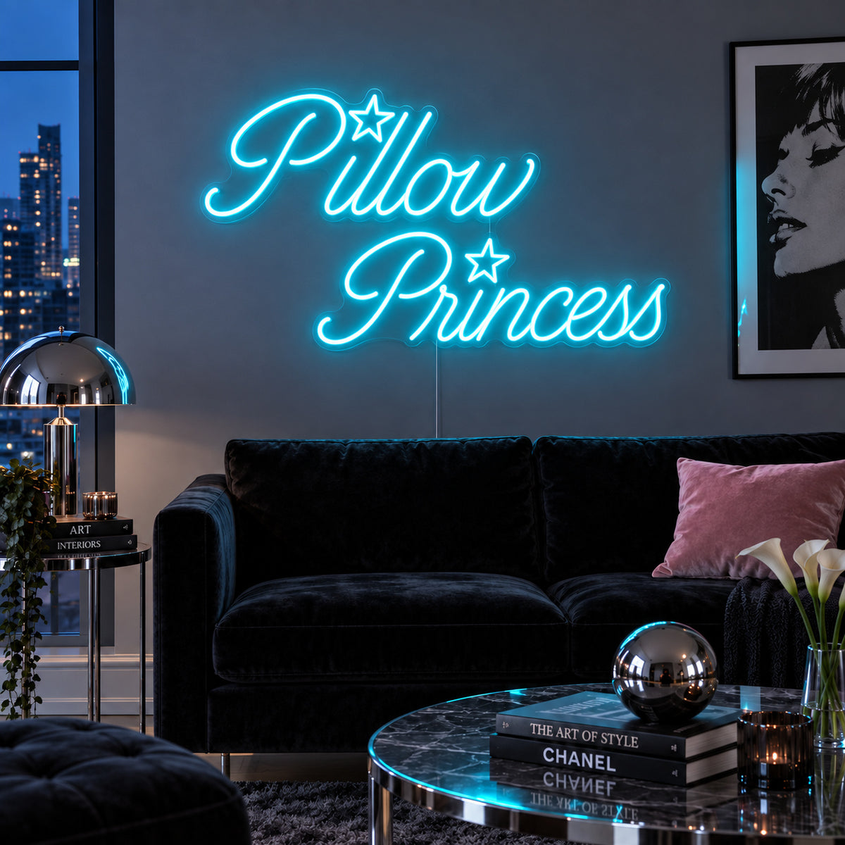 Ice Blue version of the Pillow Princess Neon Sign, shown with star details above a dark purple sofa.