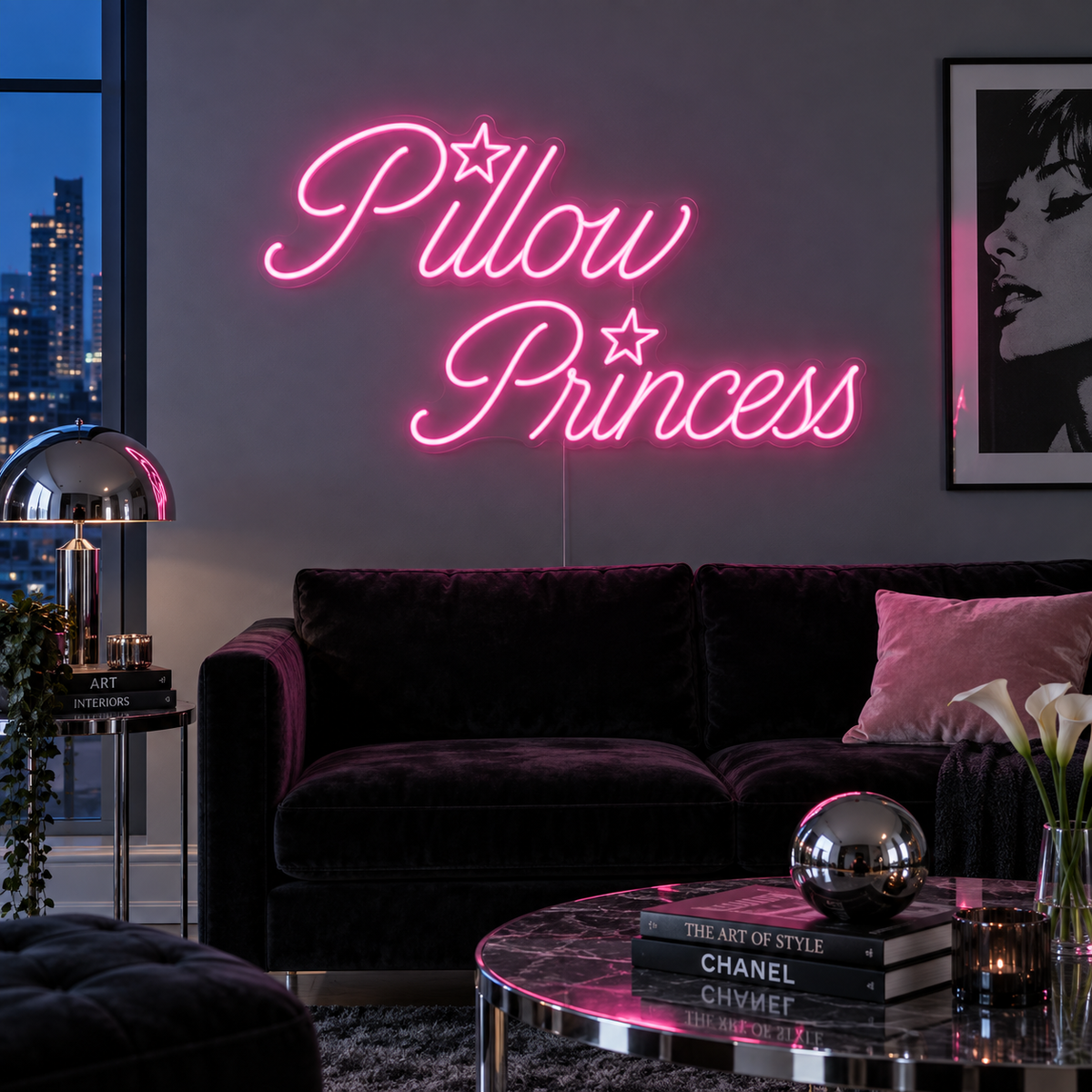 Pillow Princess Neon Sign in pink with star details above a dark purple sofa.