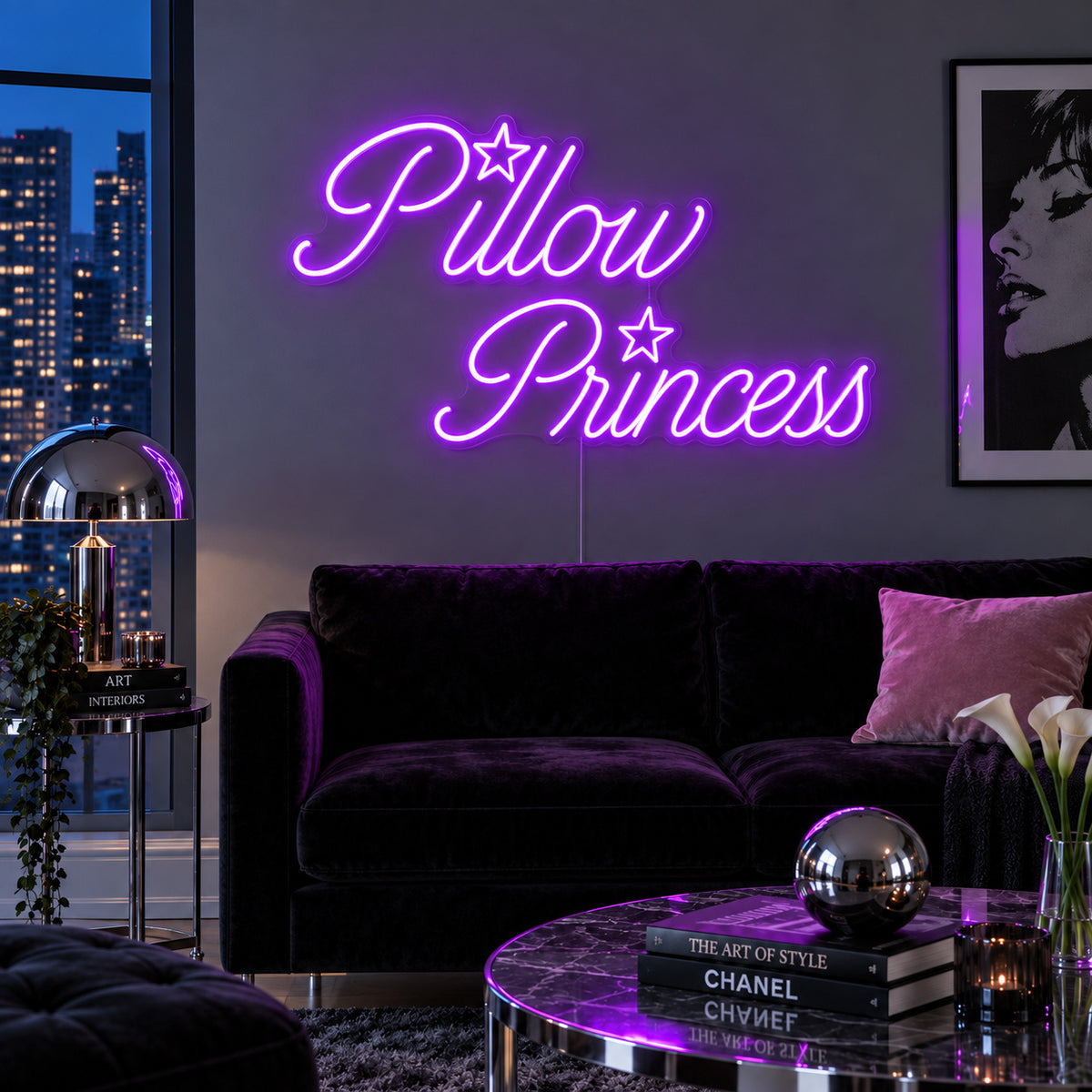 Pillow Princess Neon Sign with purple lighting, displayed with star details above a dark purple sofa.